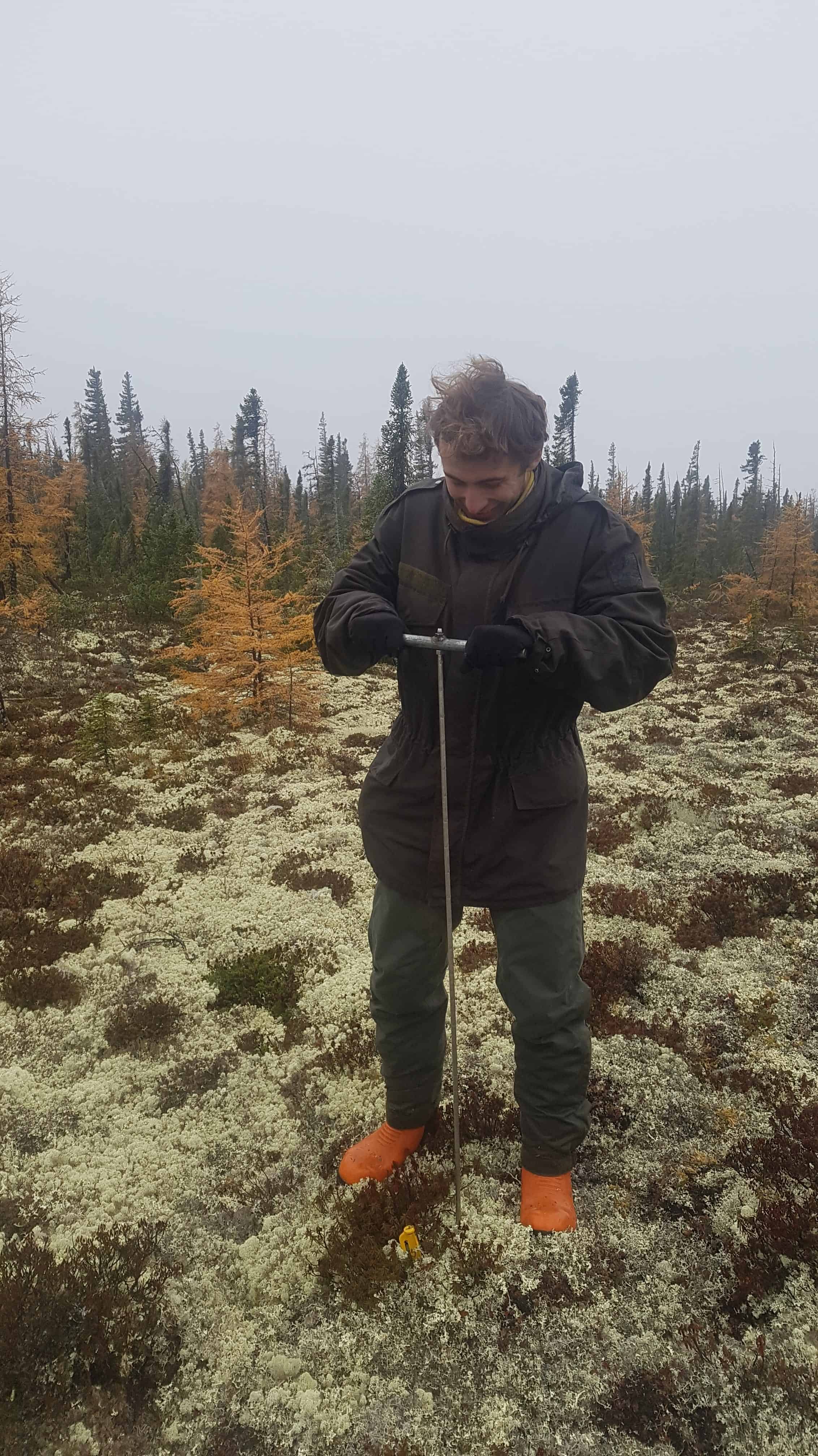 Using metal probes to check permafrost depth